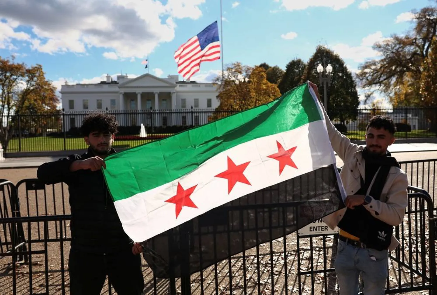  A Syrian flag is displayed outside the White House following the meeting of US President Donald Trump and Syrian President Ahmed al-Sharaa in the Oval Office of the White House in Washington, DC, US, November 10, 2025. (Reuters)
