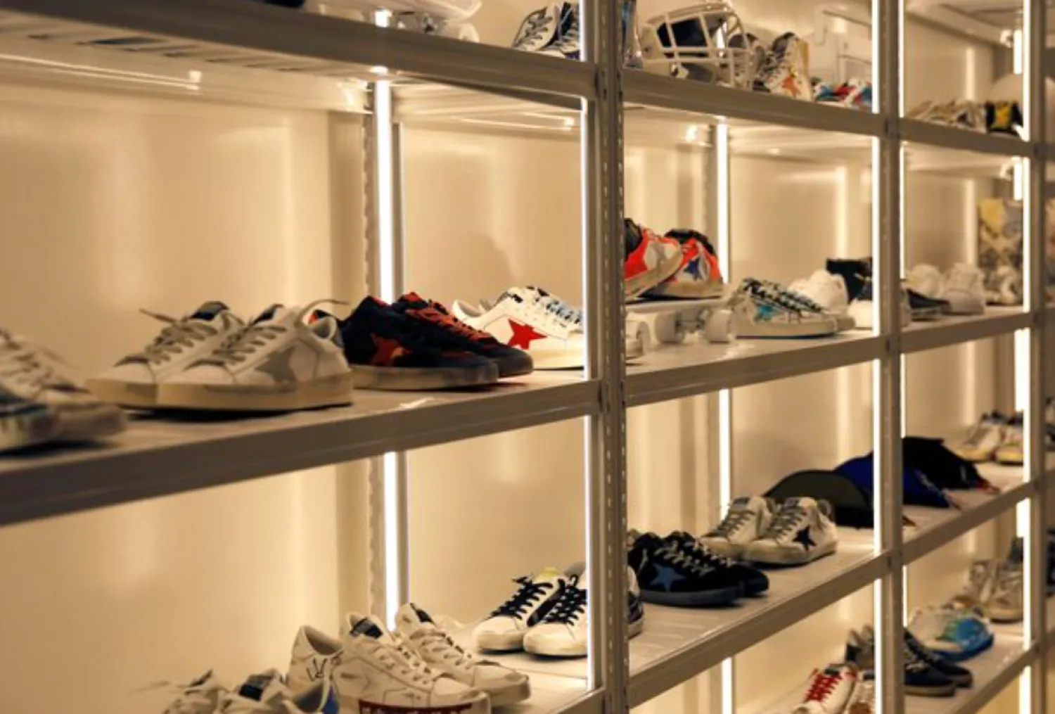 Sneakers of Italian high fashion sneaker brand Golden Goose are displayed at its store in Beijing, China September 23, 2020. Picture taken September 23, 2020. REUTERS/Tingshu Wang 