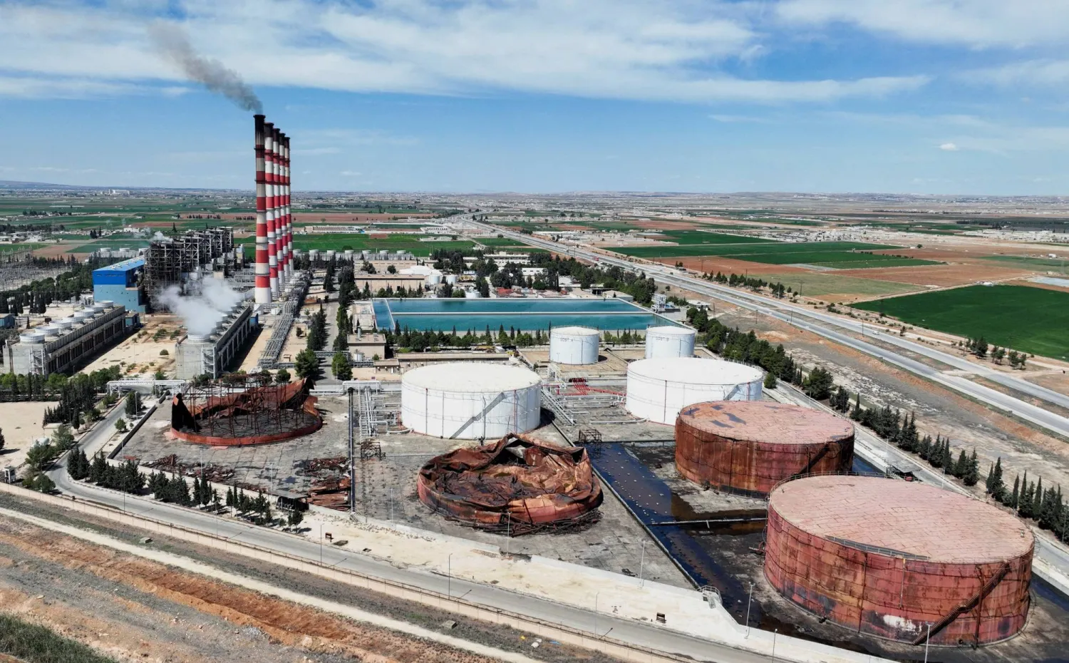 FILE PHOTO: A drone view shows the power plant in Aleppo, Syria, April 15, 2025. REUTERS/Mahmoud Hassano/File Photo