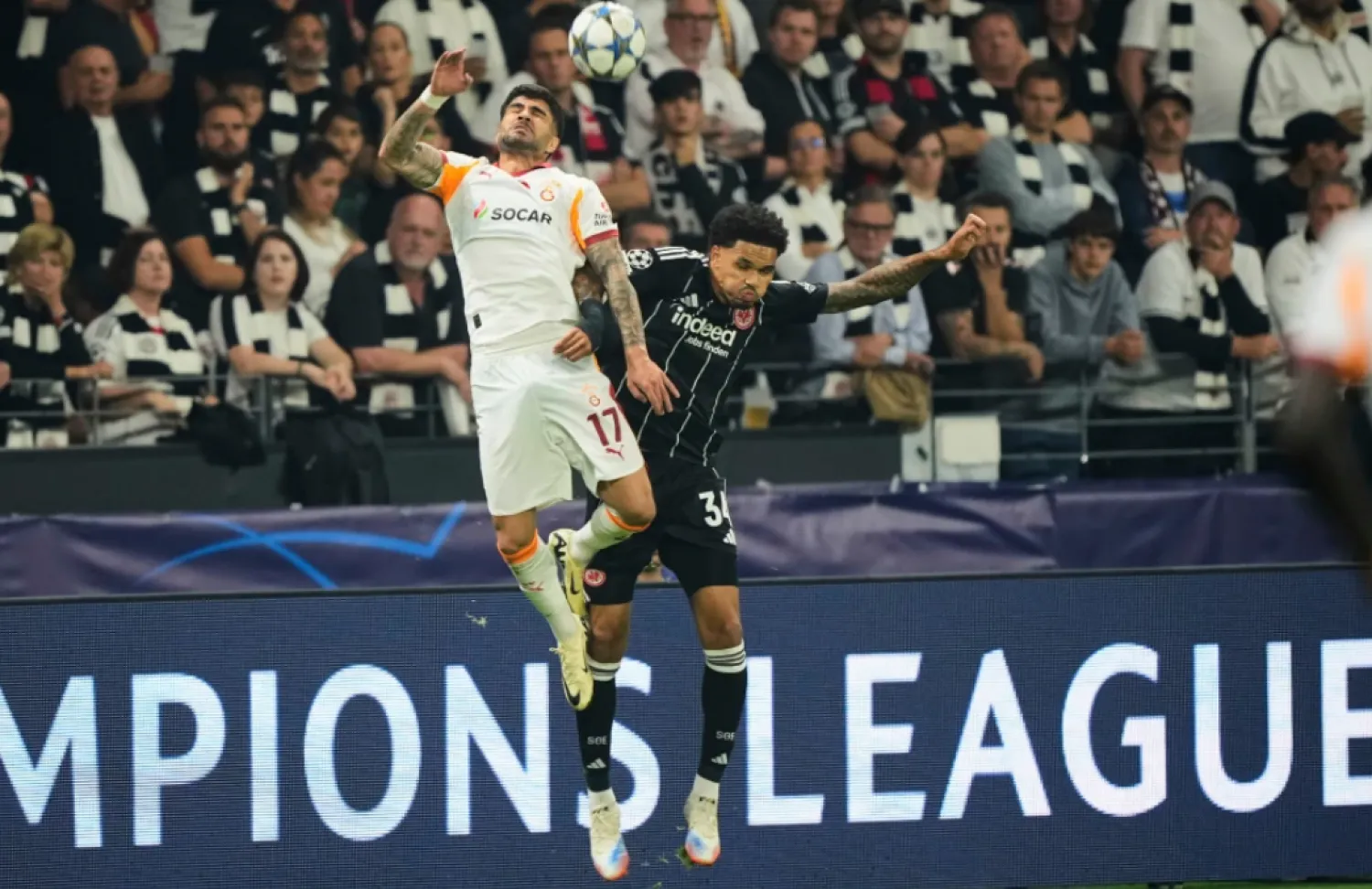 Galatasaray’s Eren Elmali, left, and Frankfurt’s Nnamdi Collins jump for a header during the Champions League opening phase soccer match between Eintracht Frankfurt and Galatasaray in Frankfurt, Germany, Thursday, Sept. 18, 2025. (AP Photo/Martin Meissner, File)

