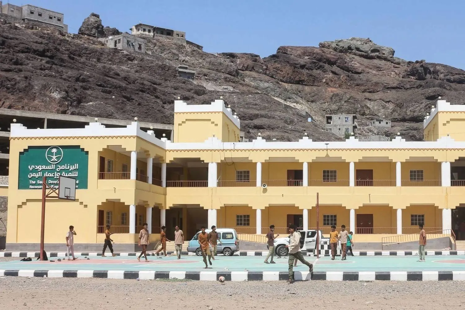 Students playing football in the courtyard of a Saudi-funded school in the city of Aden (AFP) 