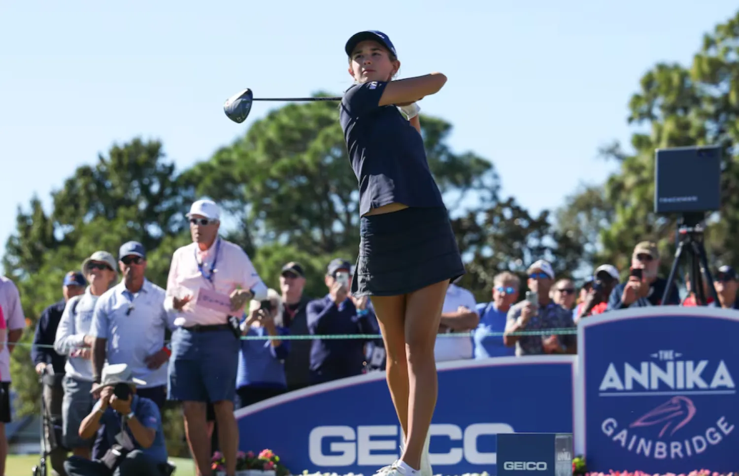 Nov 13, 2025; Belleair, Florida, USA; Kai Trump tees off on the thirteenth hole during the first round of The ANNIKA golf tournament at Pelican Golf Club. Mandatory Credit: Nathan Ray Seebeck-Imagn Images