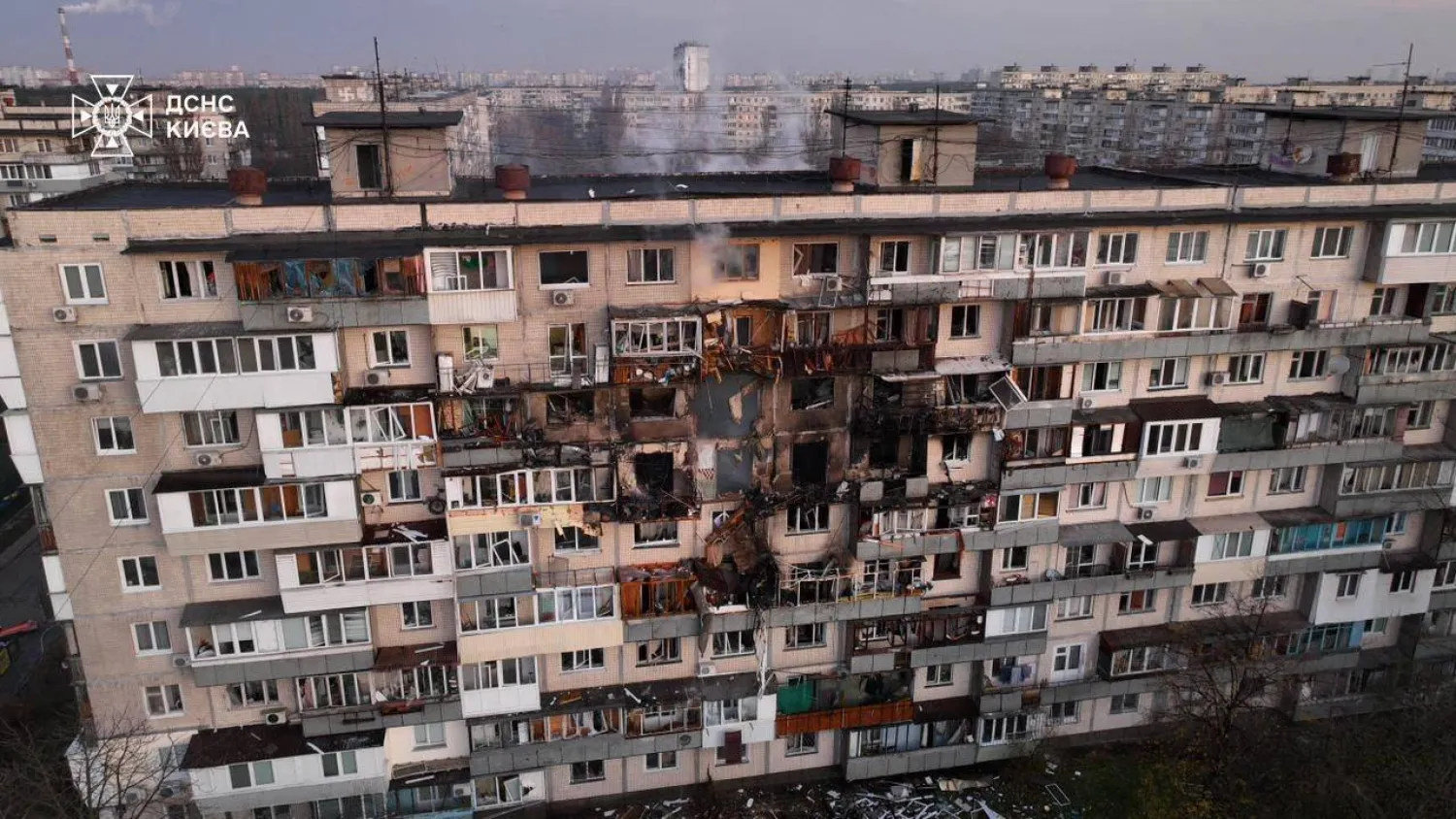 This handout photograph taken and released by the Ukrainian Emergency Service on November 14, 2025, shows a damaged residential building following an air strike in Kyiv, amid the Russian invasion of Ukraine. (Handout / Ukrainian Emergency Service / AFP) 