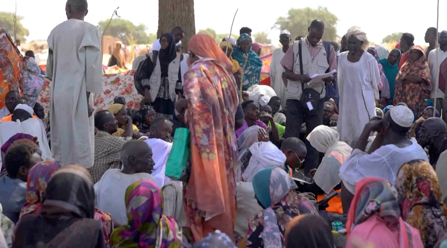 FILE PHOTO: Displaced Sudanese gather after fleeing El-Fasher city in Darfur, in Tawila, Sudan, October 29, 2025, in this still image taken from a Reuters' video. REUTERS/Mohamed Jamal/File Photo
