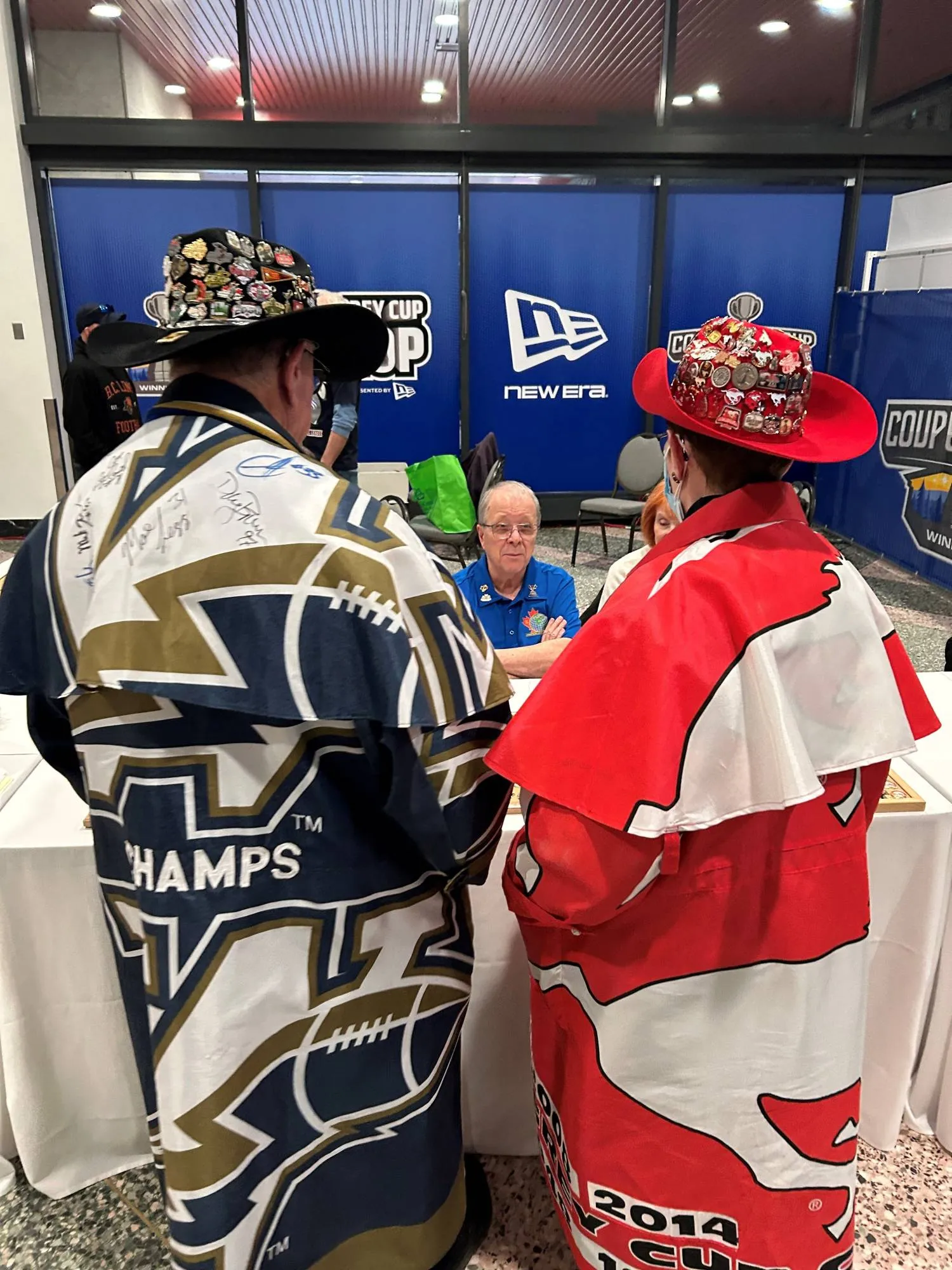 Canadian Football League supporters wear colorful outfits during the Grey Cup Championship week in Winnipeg, Manitoba, Canada, November 13, 2025. REUTERS/Ed White
