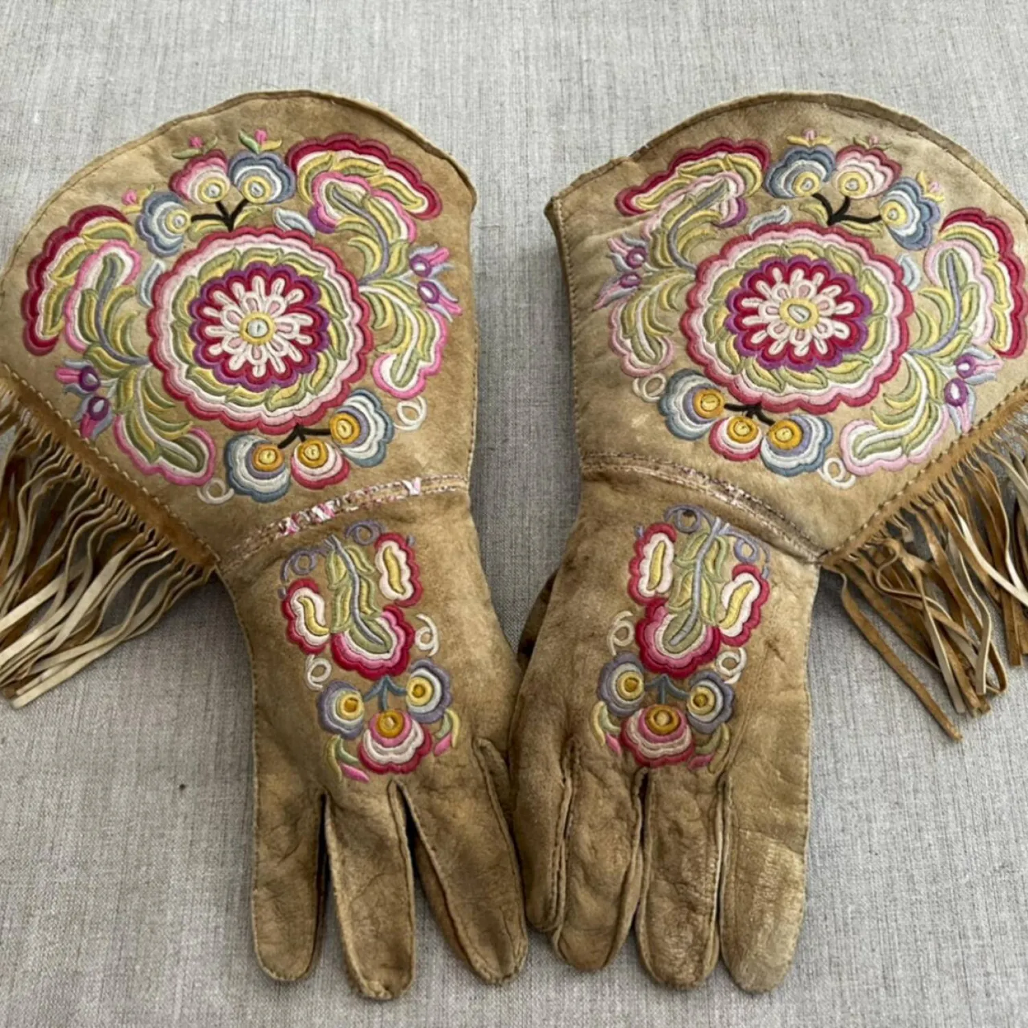 A pair of gauntlets made in the late 19th-century Cree-Metif native Canadian traditional style by indigenous activist Gregory Scofield. Gregory Scofield, AP
