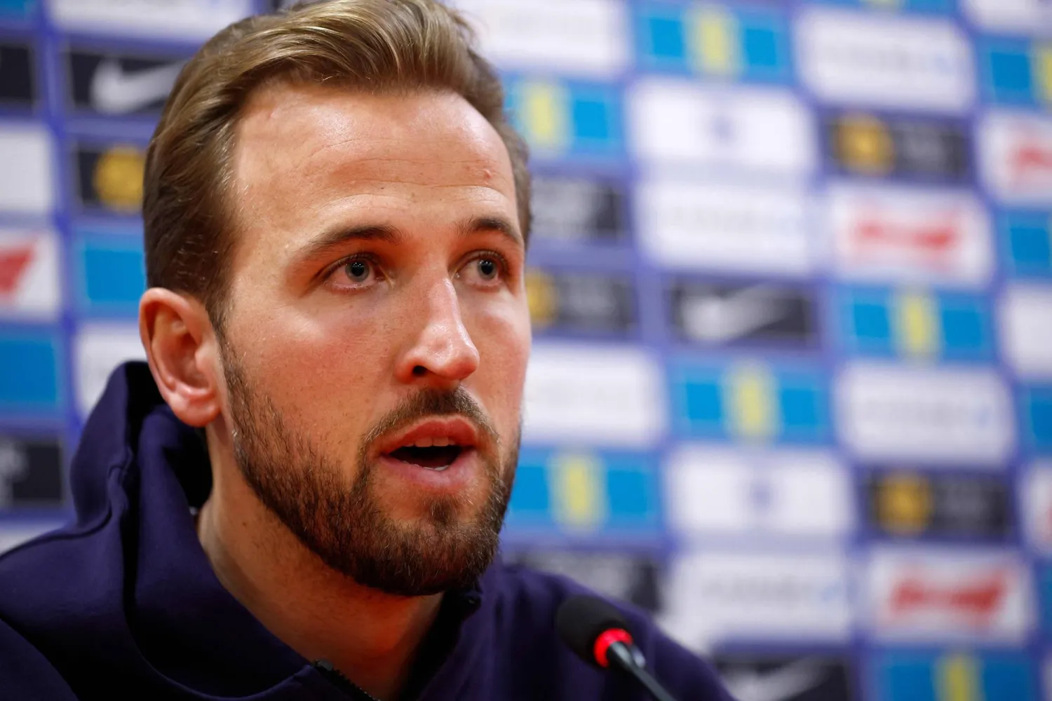 England's forward #09 Harry Kane speaks during a press press conference on the eve of the FIFA World Cup 2026 Group K European qualification football match between Albania and England, at the Air Albania stadium in Tirana, on November 15, 2025. (Photo by Adnan Beci / AFP)