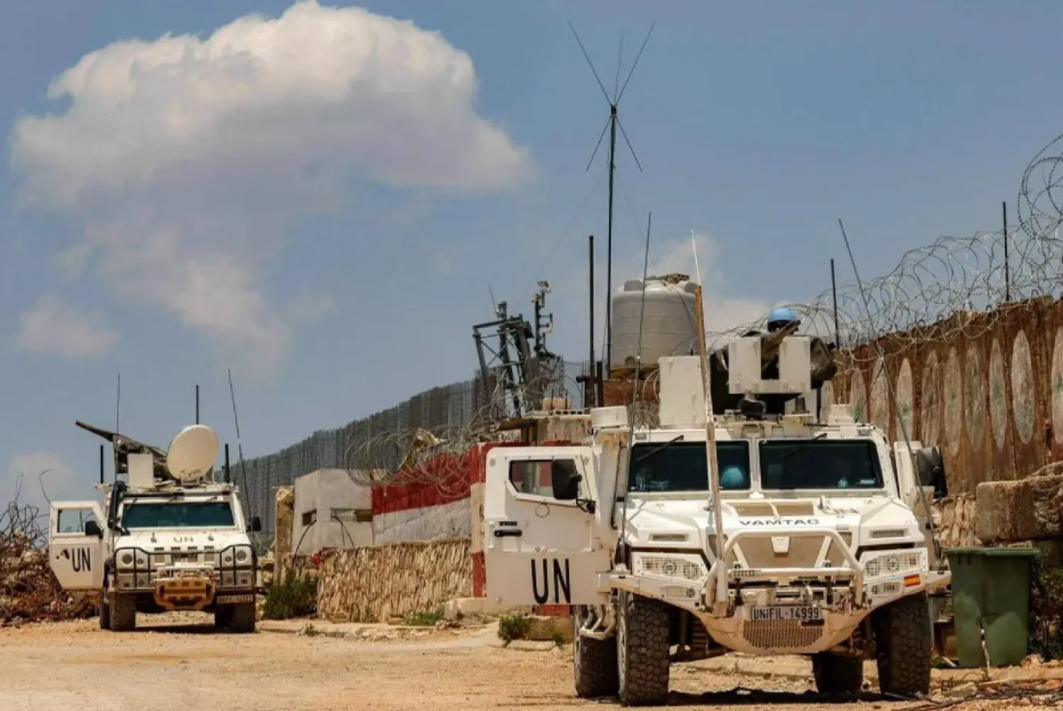 Peacekeepers of the United Nations Interim Force in Lebanon (UNIFIL) ride in armored vehicles during a patrol along the border with Israel by the village of Kfar Kila in south Lebanon on June 4, 2025. (AFP)
