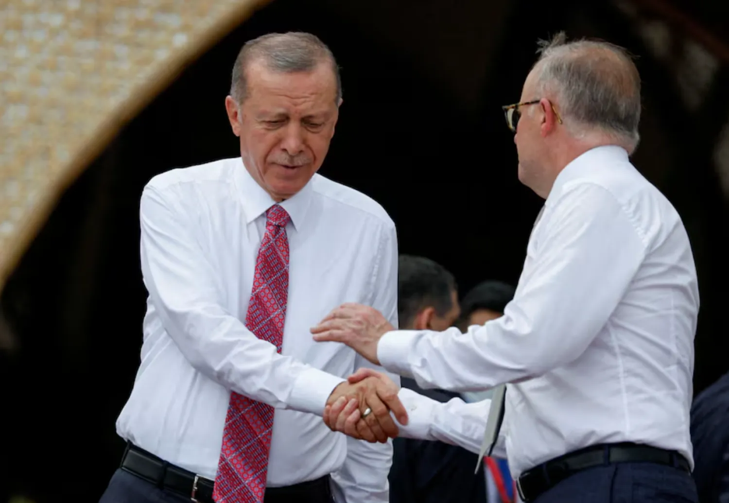 President Tayyip Erdogan shakes hands with Australia's Prime Minister Anthony Albanese before a MIKTA photo session amidst the G20 leaders' summit in Nusa Dua, Bali, Indonesia, November 15, 2022. REUTERS/Ajeng Dinar Ulfiana/Pool/File Photo 