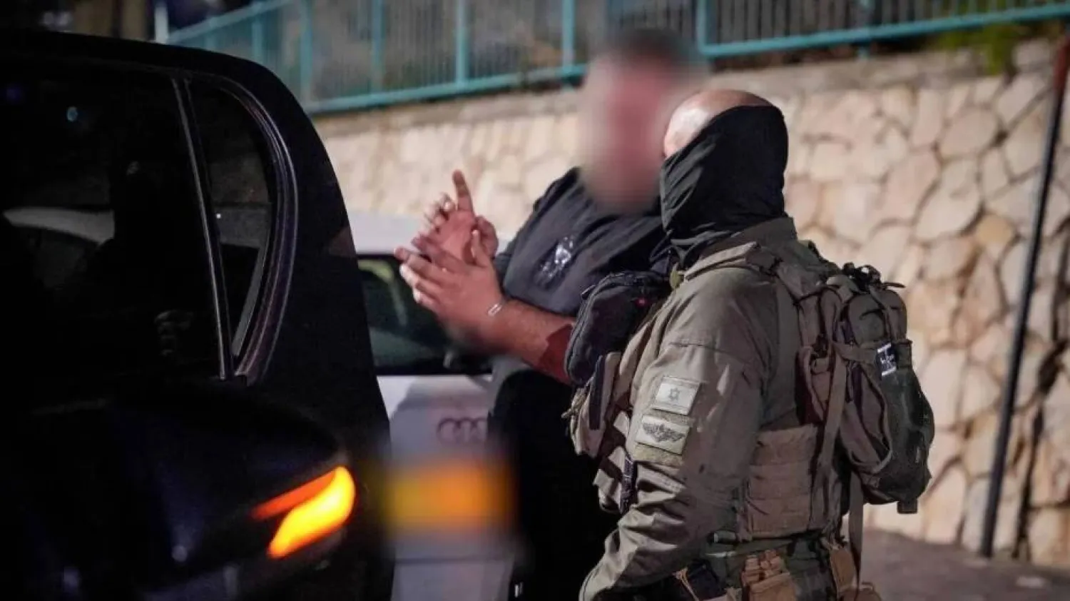 An Israeli man is detained on suspicion of spying for Iran in a photo released on December 9, 2024. (Israel Police)