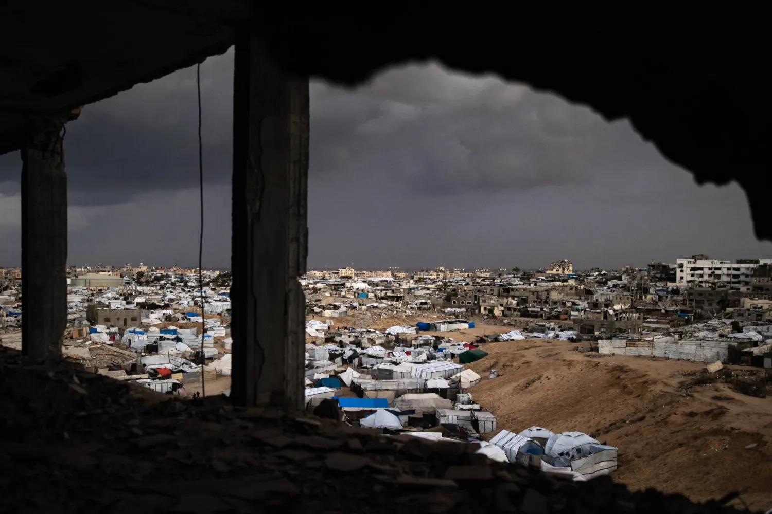 Tents of displaced Palestinians at a makeshift camp, on a rainy day in the west of Khan Yunis, southern Gaza Strip, 15 November 2025. EPA/HAITHAM IMAD