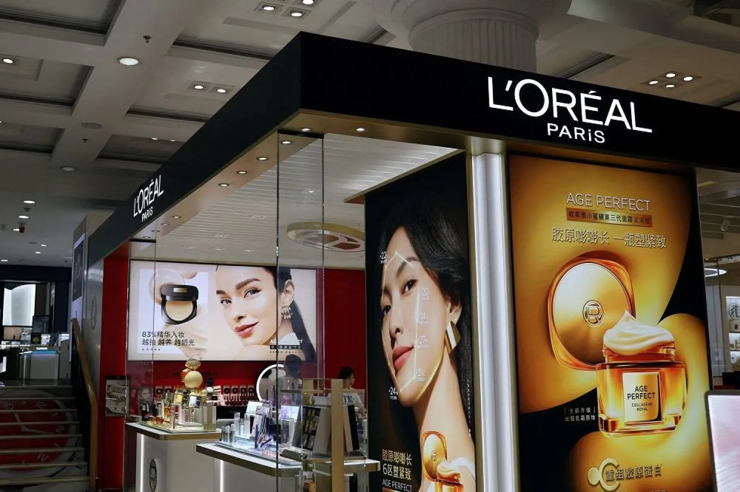 A L'Oreal sign is displayed at the beauty products section of a department store inside a shopping mall in Beijing, China June 10, 2025. (Reuters)