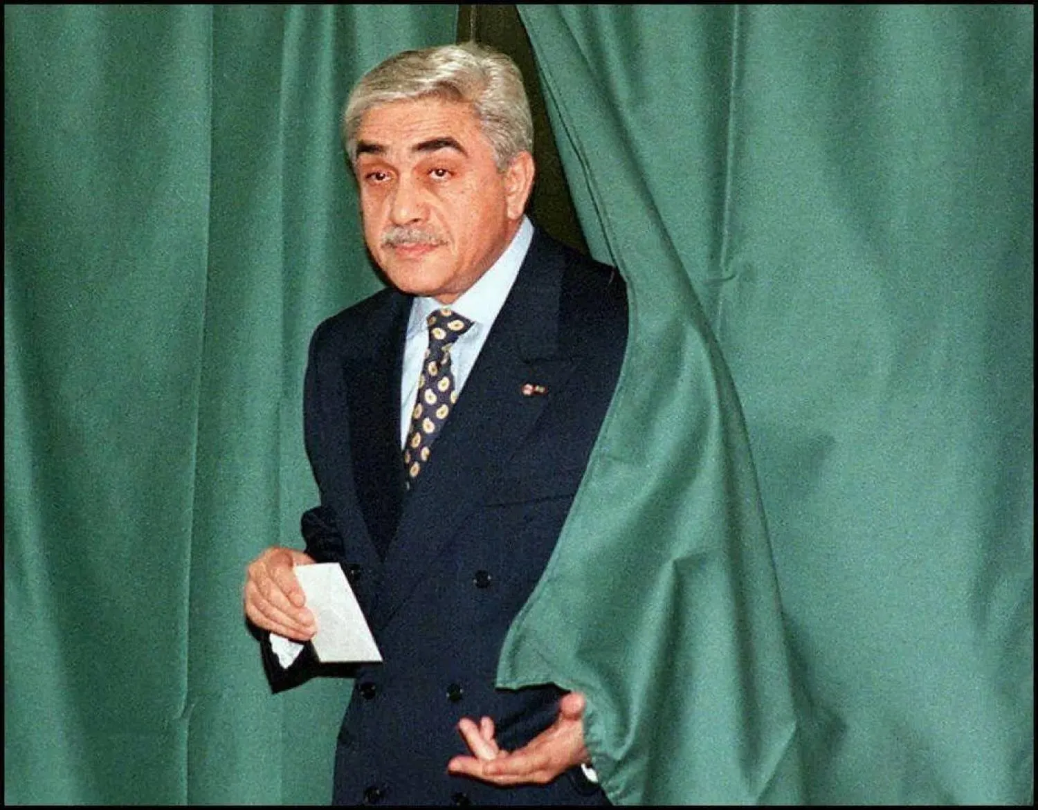 Former Algerian president Liamine Zeroual casting his vote in the 1997 parliamentary elections (AFP). 