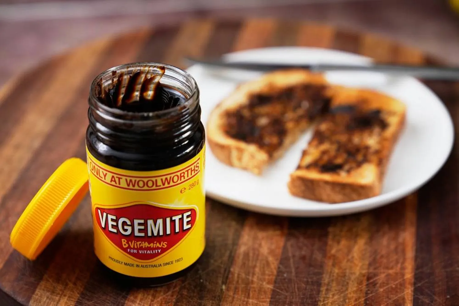 A piece of toast is prepared with Vegemite in Sydney, Australia, Monday, Nov. 17, 2025. (AP) 