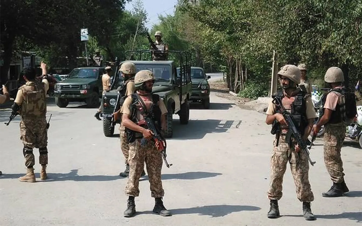 In this file photo, Pakistani soldiers cordon off a street following an attack by suicide bombers on the outskirts of Peshawar on September 2, 2016. (AFP/File)

