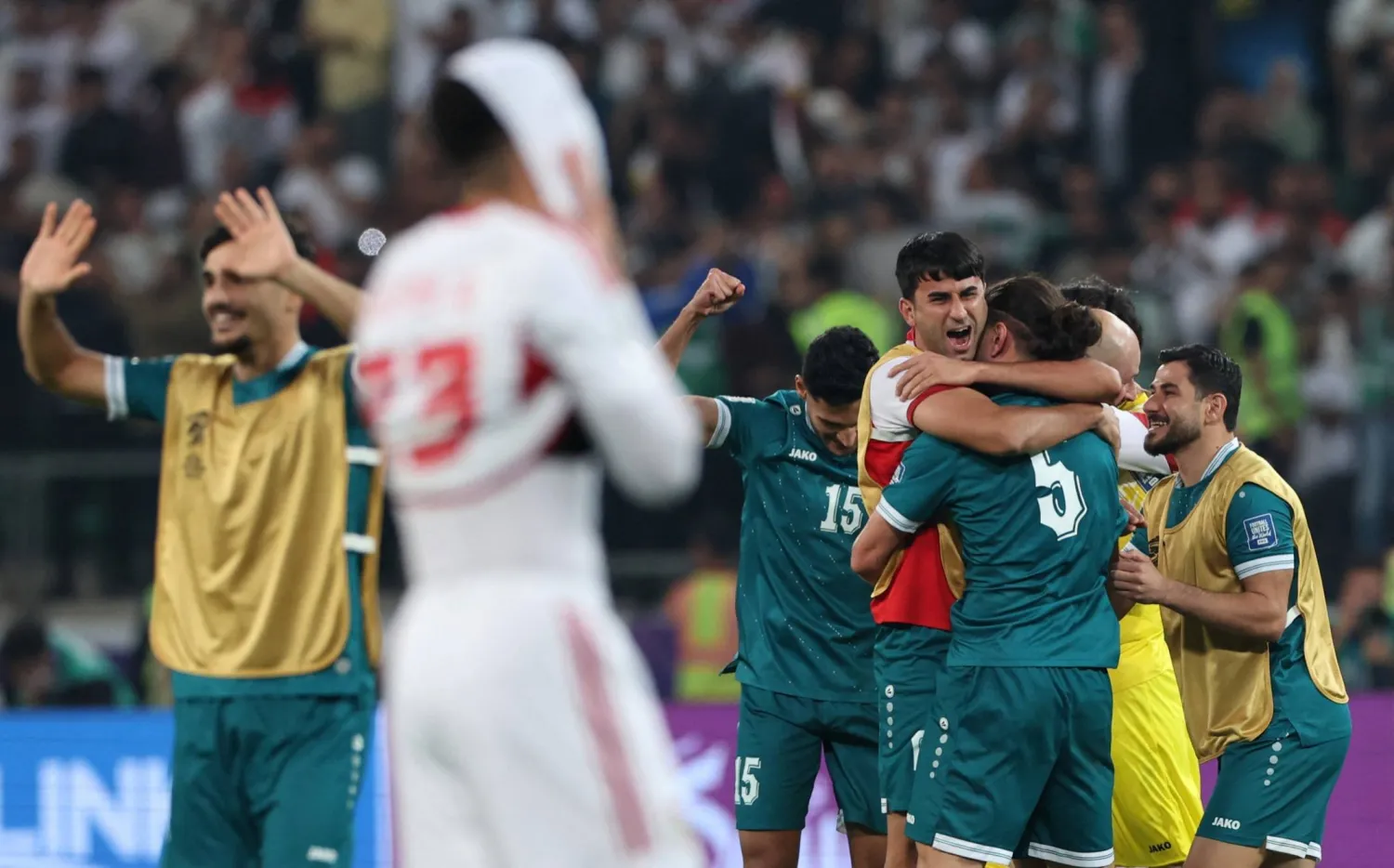  Soccer Football - FIFA World Cup - AFC Qualifiers - Play Off - Second Leg - Iraq v United Arab Emirates - Basra International Stadium, Basra, Iraq - November 18, 2025 Iraq's Manaf Younis celebrates with teammates after the match. (Reuters)