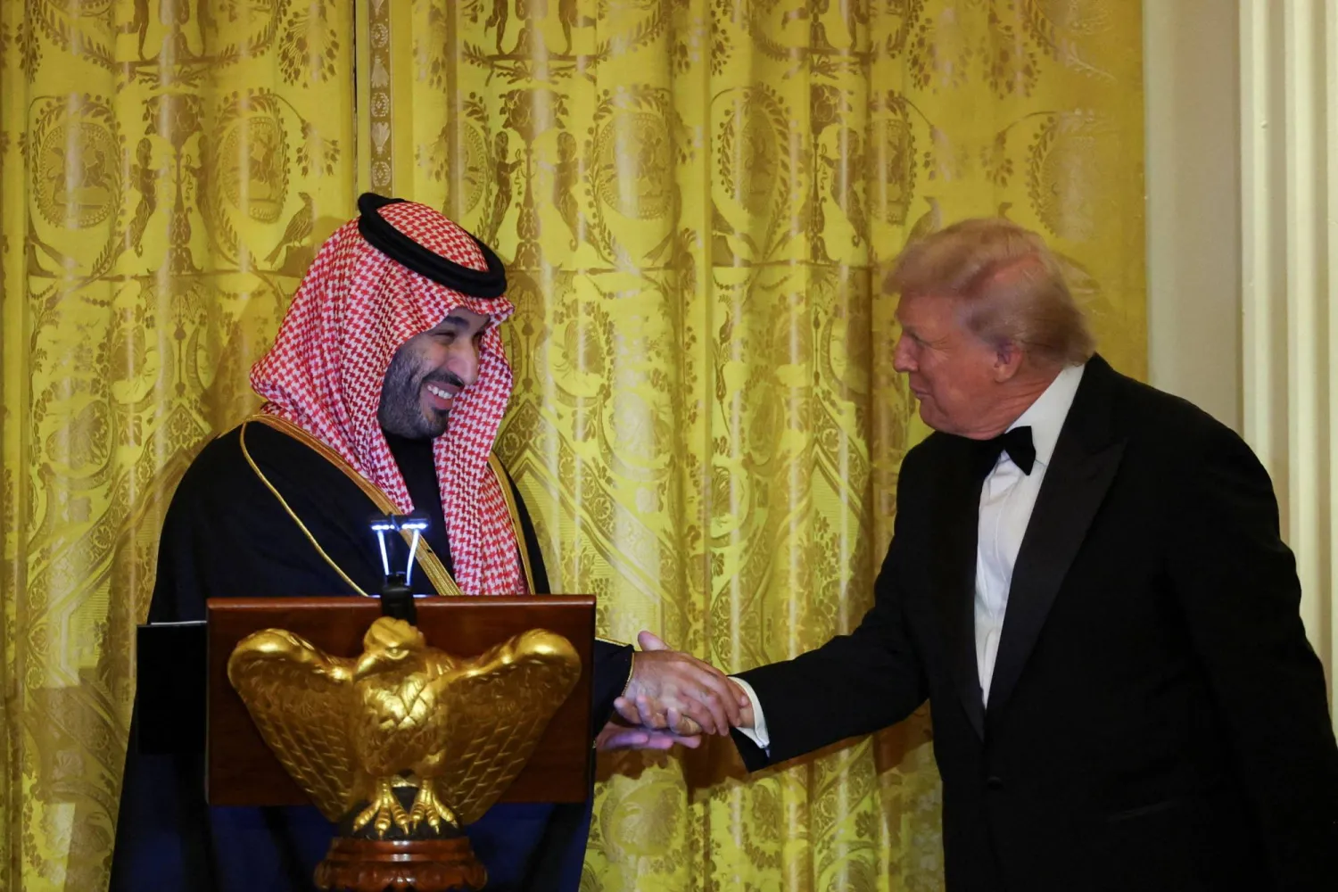 US President Donald Trump greets Prince Mohammed bin Salman, Crown Prince and Prime Minister, during a dinner at the White House in Washington, DC, US, November 18, 2025. (Reuters)  