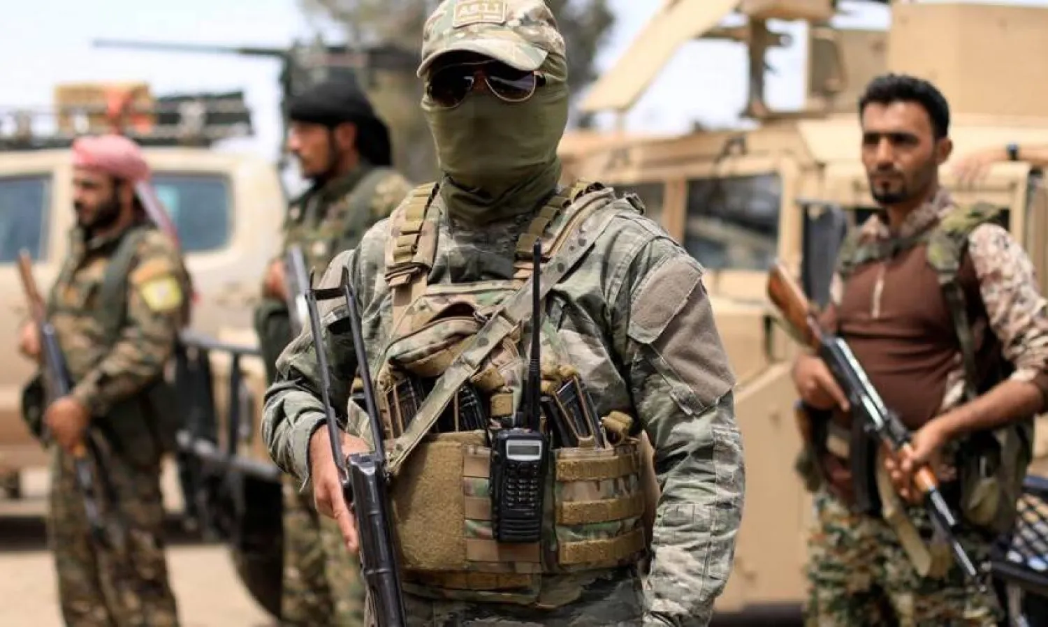  Members of the SDF in Deir Ezzor. (Reuters)