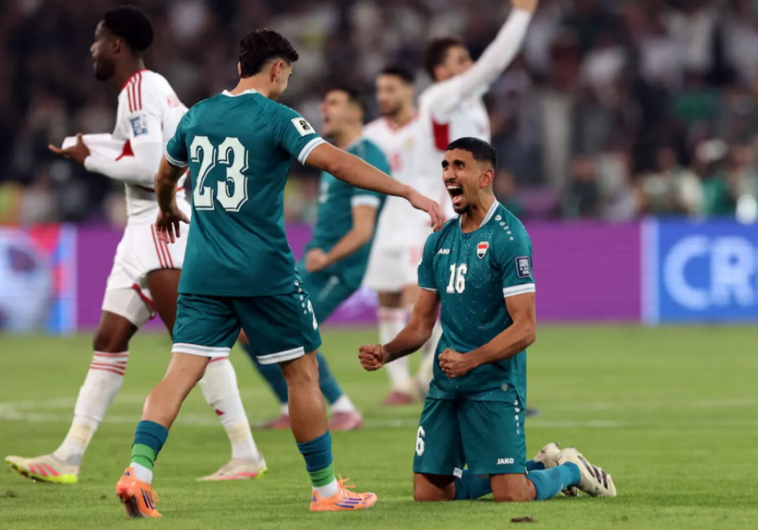 FIFA World Cup - AFC Qualifiers - Play Off - Second Leg - Iraq v United Arab Emirates - Basra International Stadium, Basra, Iraq - November 18, 2025 Iraq's Amir Al-Ammari and Merchas Doski celebrate after the match REUTERS/Thaier Al-Sudani 