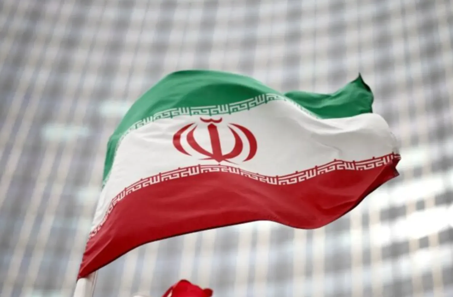 Iranian flag flies in front of the UN office building, housing IAEA headquarters, in Vienna, Austria, May 24, 2021. REUTERS/Lisi Niesner/File Photo
