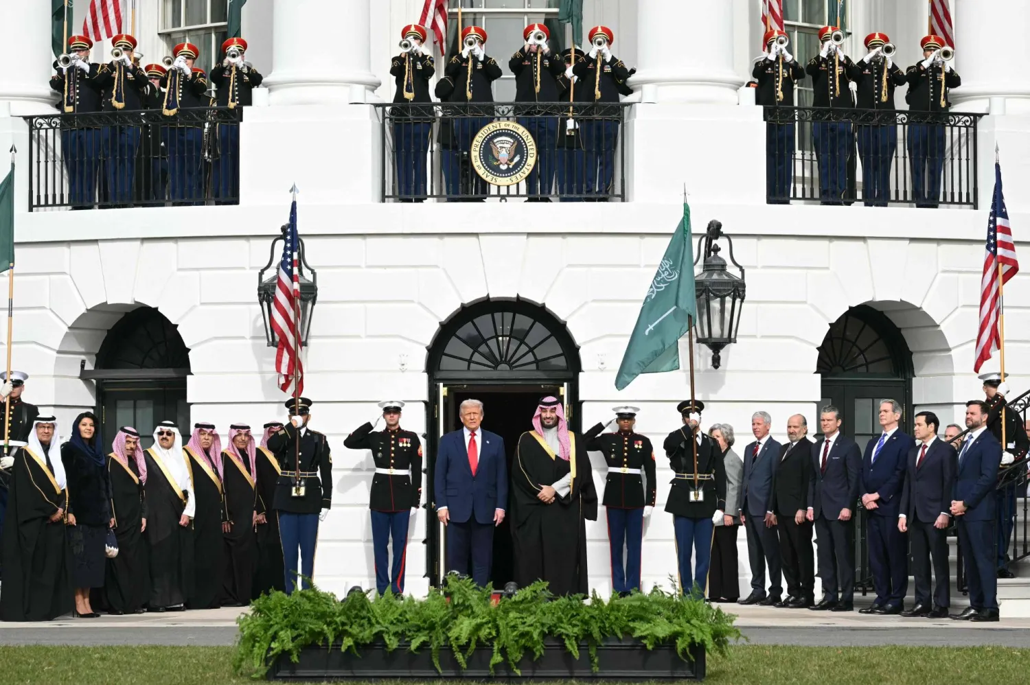 US President Donald Trump greets Crown Prince and Prime Minister of the Kingdom of Saudi Arabia Mohammed bin Salman on the South Lawn at the White House in Washington, DC on November 18, 2025. (Photo by SAUL LOEB / AFP)