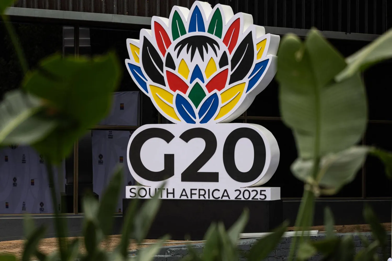 A general view of the G20 South Africa 2025 logo ahead of the G20 leaders summit at the Nasrec Expo Center in Johannesburg on November 18, 2025. (Photo by EMMANUEL CROSET / AFP)