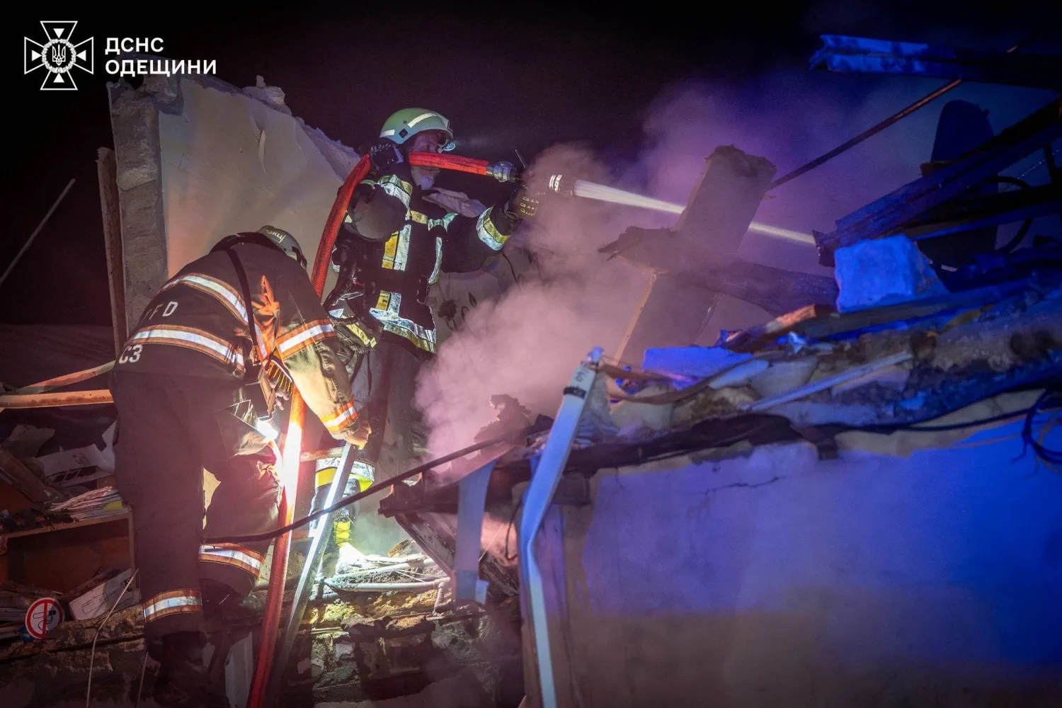 Firefighters work at the site of a residential building damaged during an overnight Russian drone strike, amid Russia's attack on Ukraine, in Odesa, Ukraine, in this handout picture released on November 21, 2025. Press service of the State Emergency Service of Ukraine in Odesa region/Handout via REUTERS 