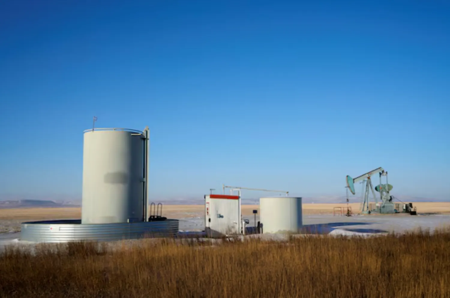 A view of an oil pump jack on the prairies near Claresholm, Alberta, Canada January 18, 2025. REUTERS/Todd Korol 