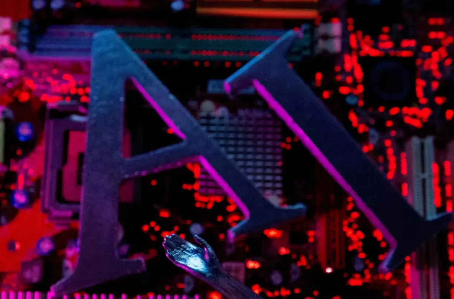 AI (Artificial Intelligence) letters and robot hand are placed on computer motherboard in this illustration created on June 23, 2023. REUTERS/Dado Ruvic/Illustration/File Photo
