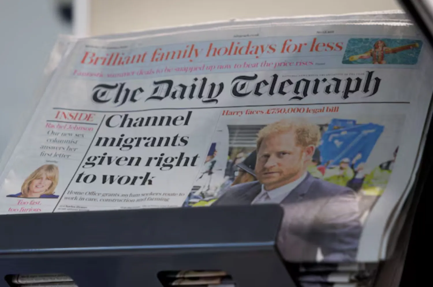 Copies of The Daily Telegraph are displayed on a rack in a supermarket in London, Britain, January 20, 2024. REUTERS/Belinda Jiao/File Photo 