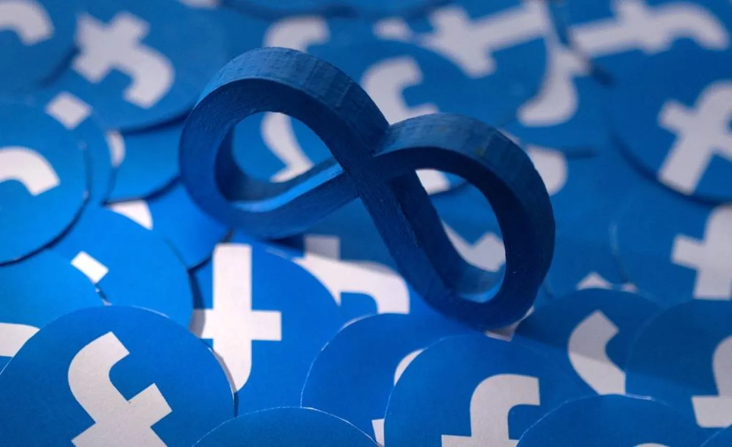 Meta and Facebook logos are seen in this illustration taken February 15, 2022. (Reuters)