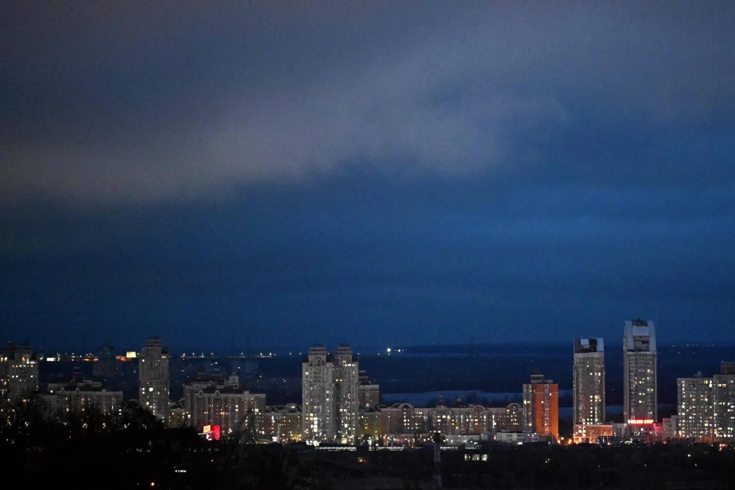  This photograph shows the city skyline in the evening hours in Kyiv, on November 22, 2025, amid the Russian invasion of Ukraine. (AFP) 