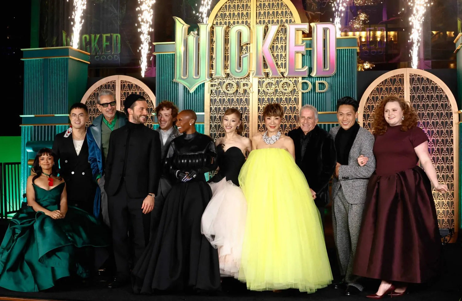  British actress Cynthia Erivo (6th-L), US singer-songwriter Ariana Grande (5th-R) and other cast members attend the premiere of "Wicked: For Good" at Lincoln Center for the Performing Arts in New York on November 17, 2025. (AFP) 