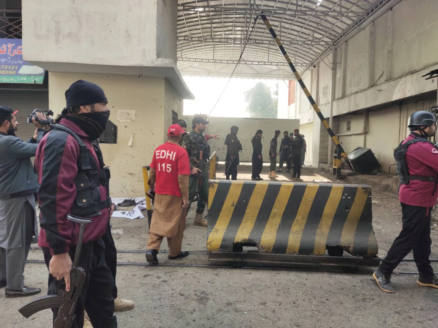 Pakistani security officials inspect the scene of a militant attack at the paramilitary FC headquarters in Peshawar, the provincial capital of KPK, Pakistan, 24 November 2025. EPA/BILAWAL ARBAB
