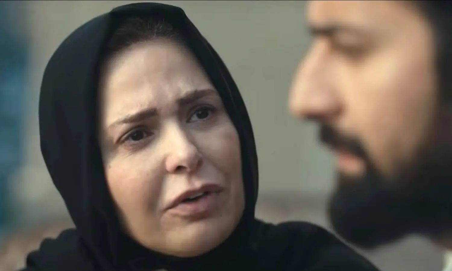 صابرين وأحمد حاتم في مشهد من «الملحد» (الشركة المنتجة)