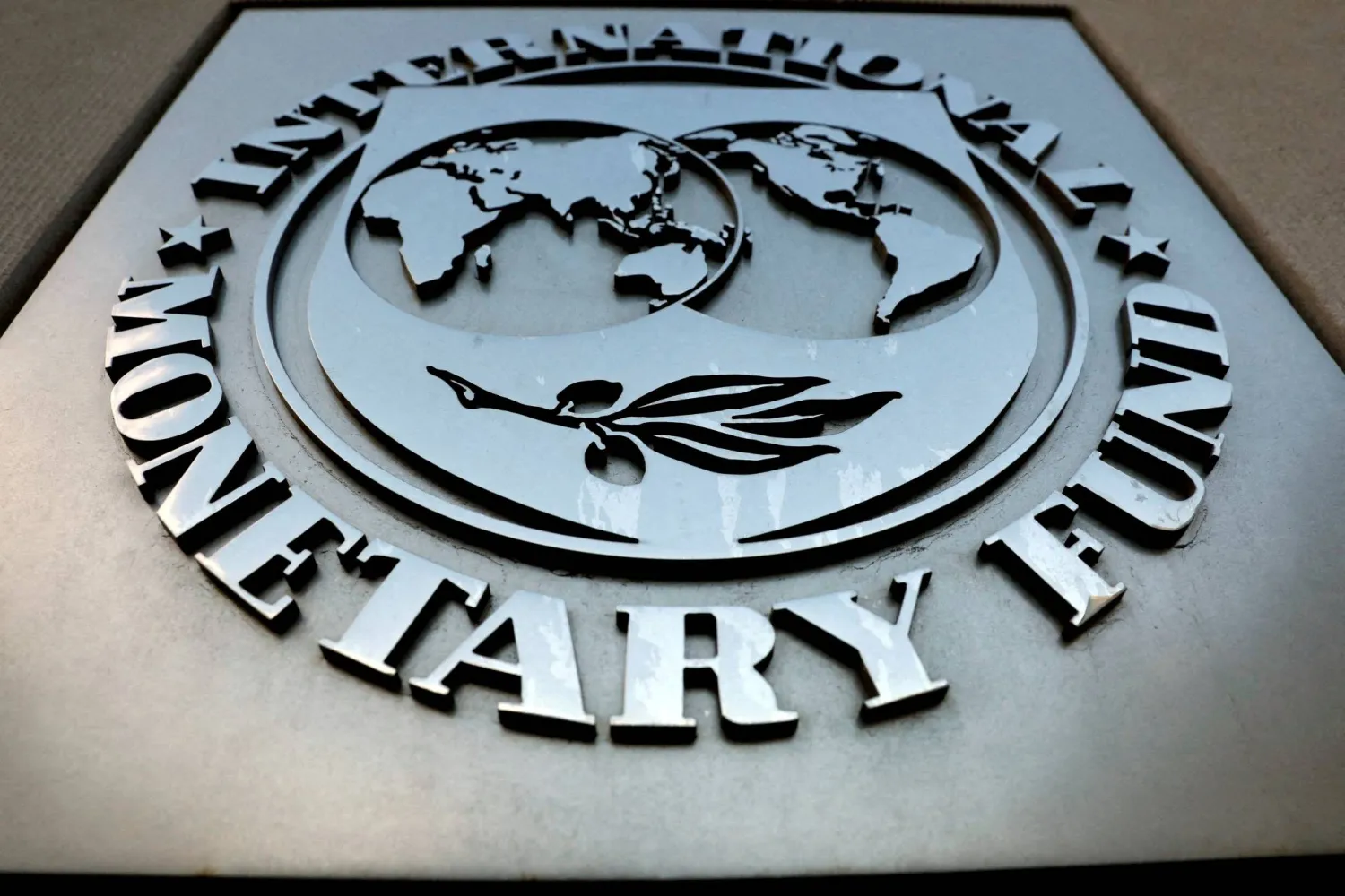 FILE PHOTO: The International Monetary Fund logo is seen outside the headquarters building in Washington, US September 4, 2018. REUTERS/Yuri Gripas//File Photo