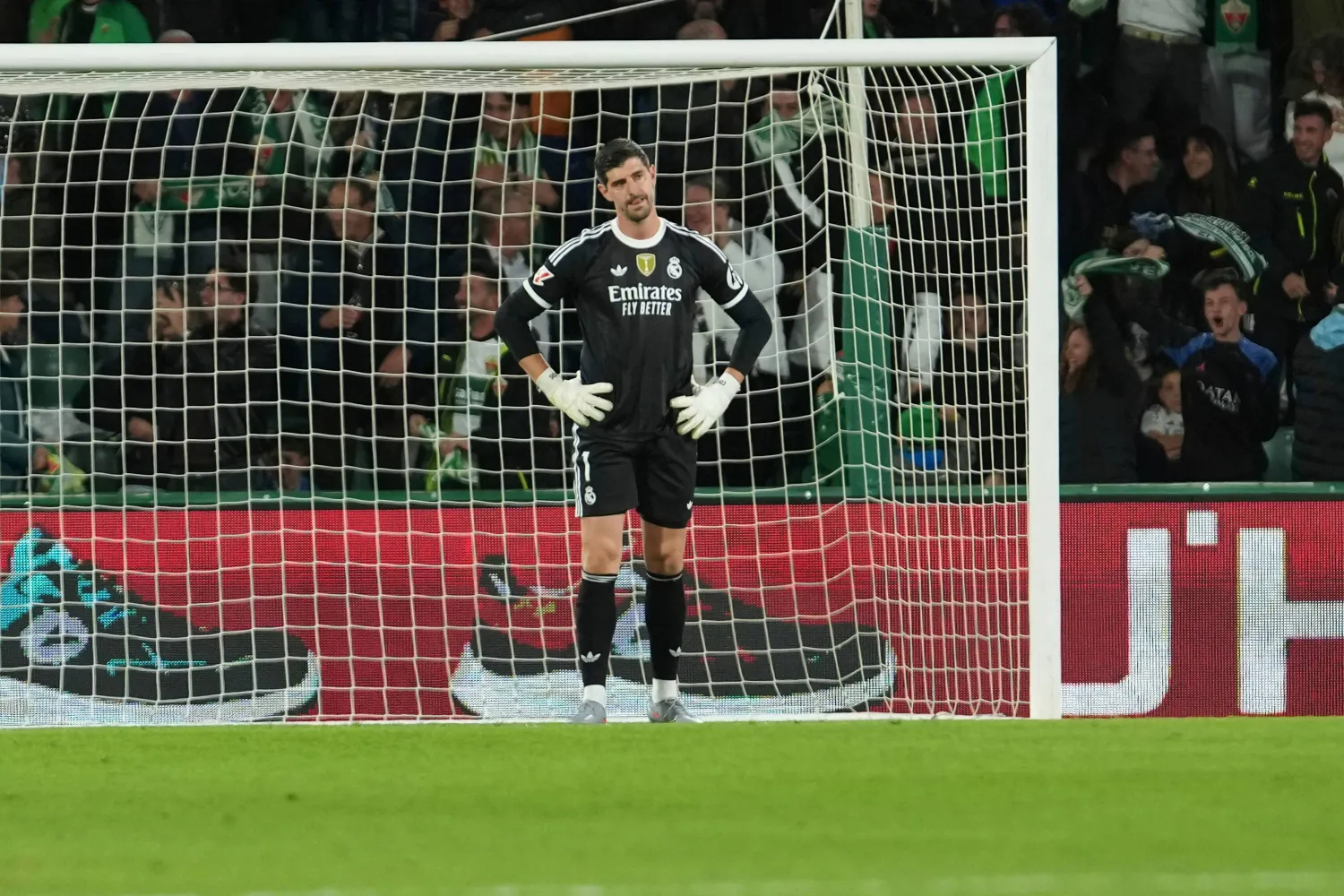 Real Madrid's goalkeeper Thibaut Courtois reacts after Elche's Alvaro Rodrigue scored his side's second goal during the Spanish La Liga soccer match between Elche and Real Madrid in Elche, Spain, Sunday, Nov. 23, 2025. (AP)