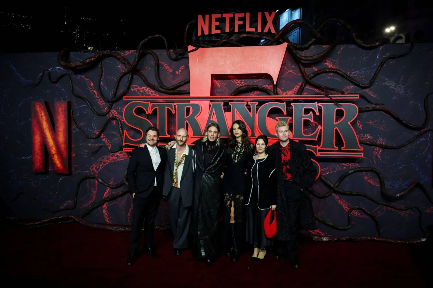Cast member Jamie Campbell Bower and guests attend the screening for the final season of the television series "Stranger Things", at Odeon Luxe Leicester Square in London, Britain, November 13, 2025. REUTERS/Isabel Infantes