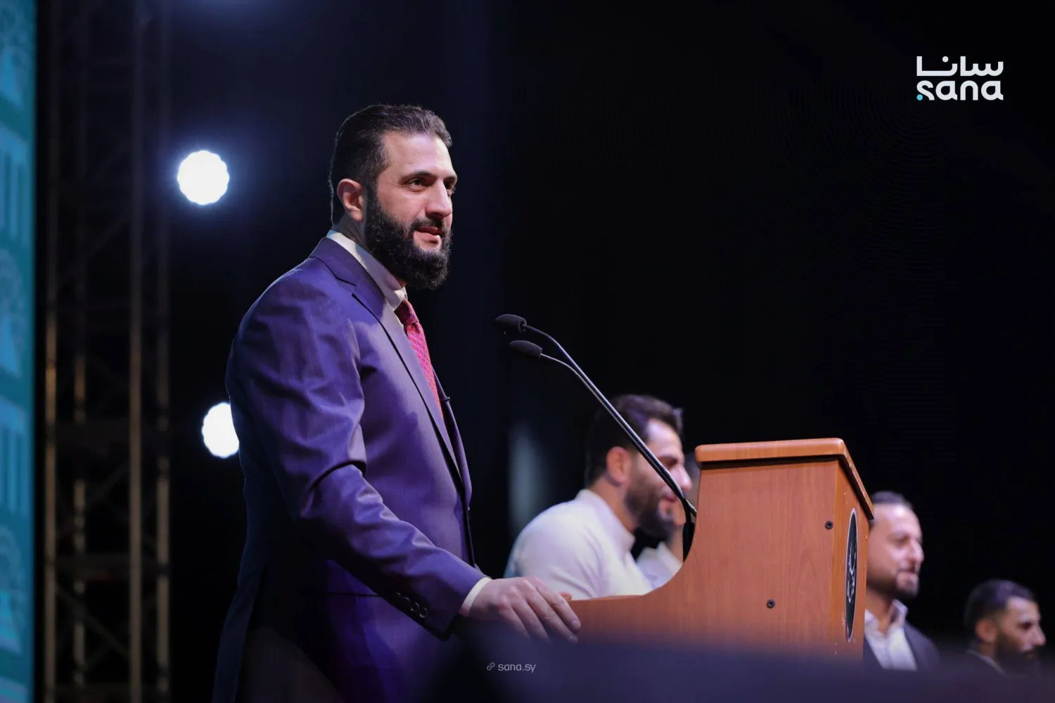 الشرع خلال إلقائه كلمته (سانا)