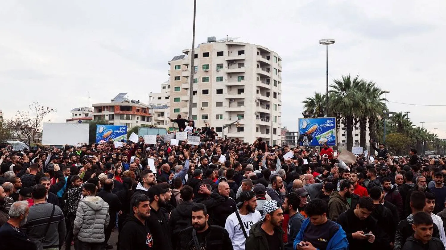 Alawites gather during a protest to demand federalism and the release of detained members of their community, in Latakia, Syria November 25, 2025. (Reuters)