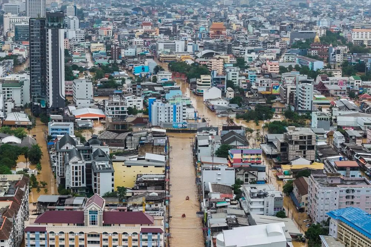 A drone view shows rescuers navigating in their boats along a flooded street in Hat Yai district, affected by heavy rainfall which has impacted several provinces in southern of Thailand and has killed several people, in Songkhla province, Thailand, November 26, 2025. (Reuters)