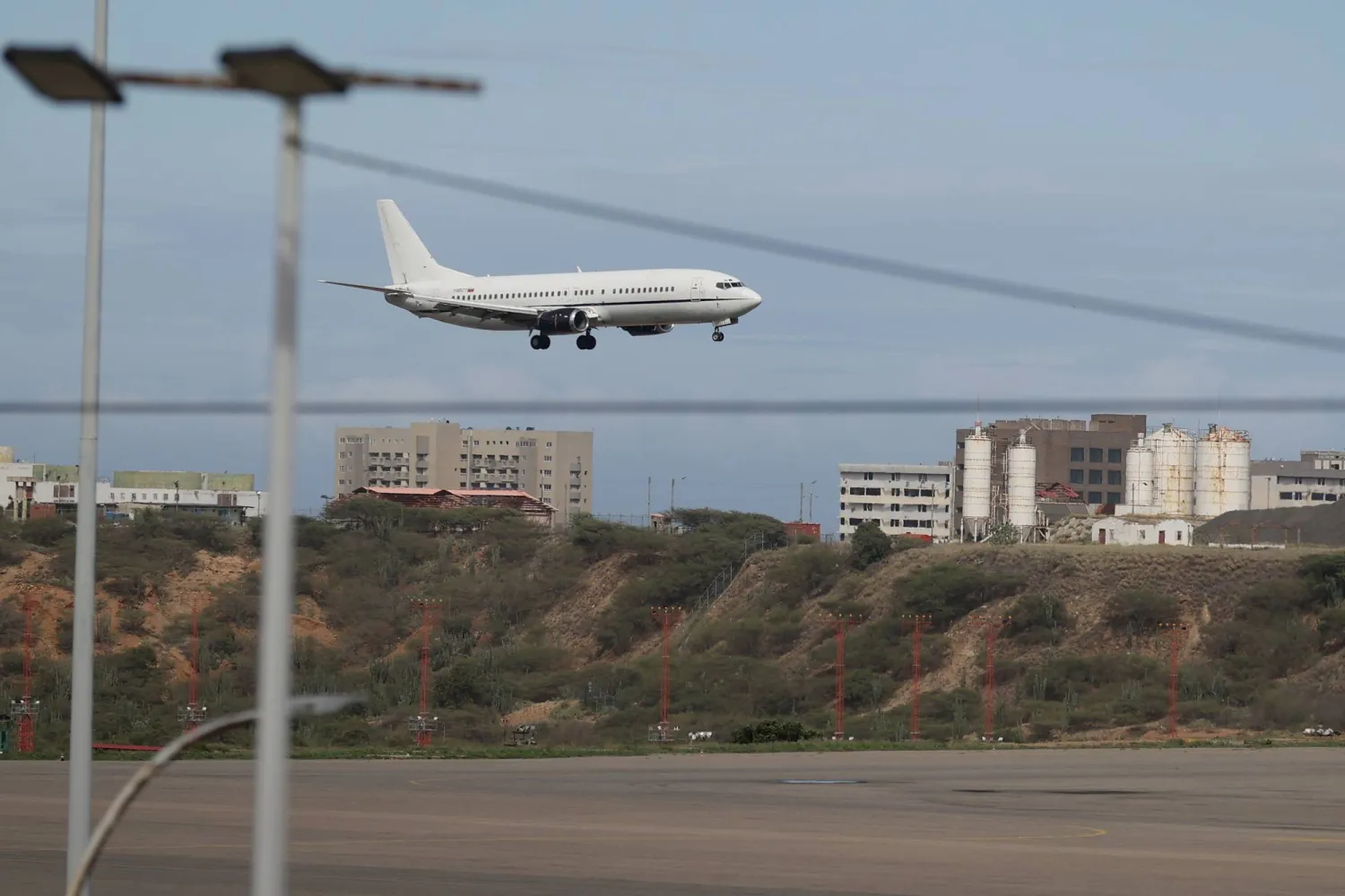 A plane lands at Simon Bolivar International Airport in Maiquetia, near Caracas, Venezuela, 26 November 2025. EPA/RONALD PENA R.