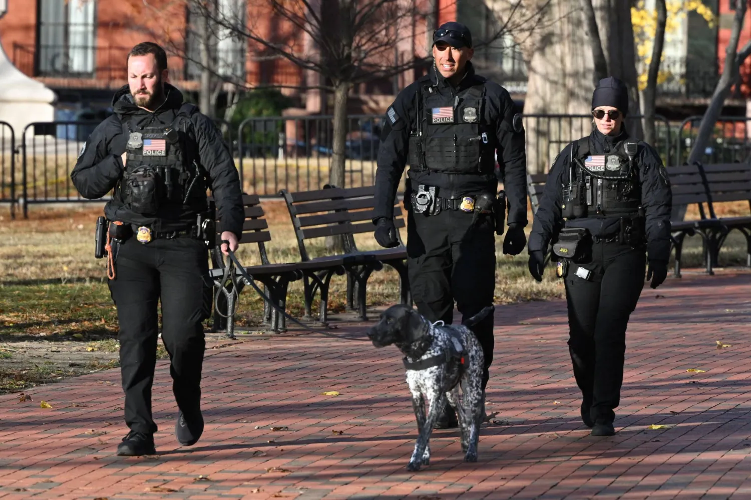 Secret Service uniformed division officers patrol in Lafayette Square across from the White House, in Washington, DC on November 27, 2025. (Photo by MANDEL NGAN / AFP)