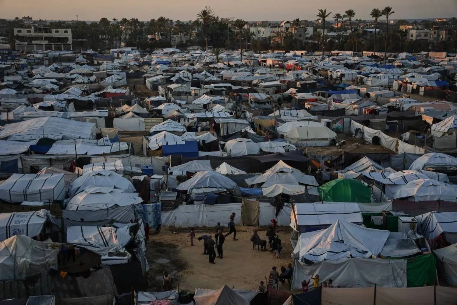 Temporary tents shelter displaced Palestinians in Deir al Balah in central Gaza (AP)