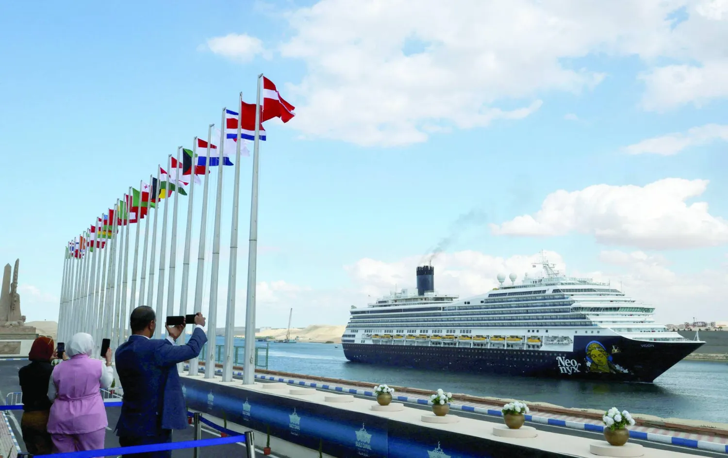 A vessel passes through the Suez Canal, Egypt, November 25, 2025. REUTERS/Mohamed Abd El Ghany      