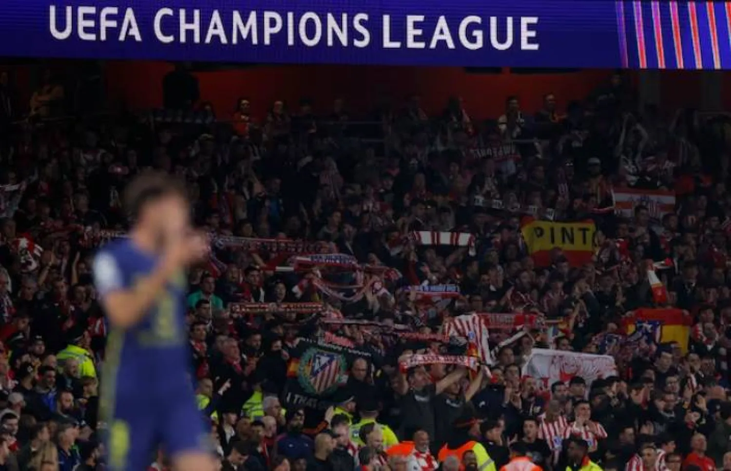 Soccer Football - UEFA Champions League - Arsenal v Atletico Madrid - Emirates Stadium, London, Britain - October 21, 2025 Atletico Madrid fans hold up scarves Action Images via Reuters/Andrew Couldridge