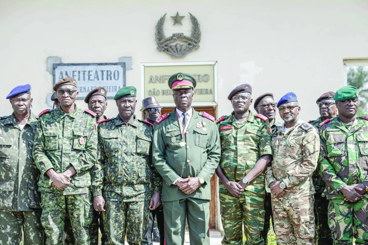 Guinea Bissau Army general Horta N'Tam (C) poses with other military leaders after being sworn in as the transition leader and the leader of the High Command in Bissau on November 27, 2025. (Photo by Patrick MEINHARDT / AFP)
