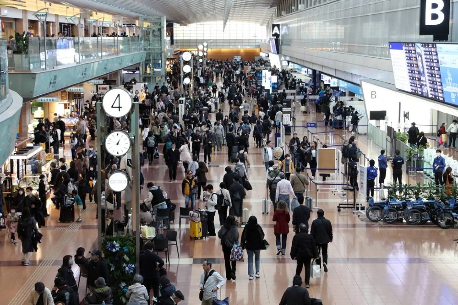 Haneda Airport’s Terminal 2 is crowded with travellers due to flight cancellations, in Tokyo, Japan, 29 November 2025. (EPA/Jiji Press)