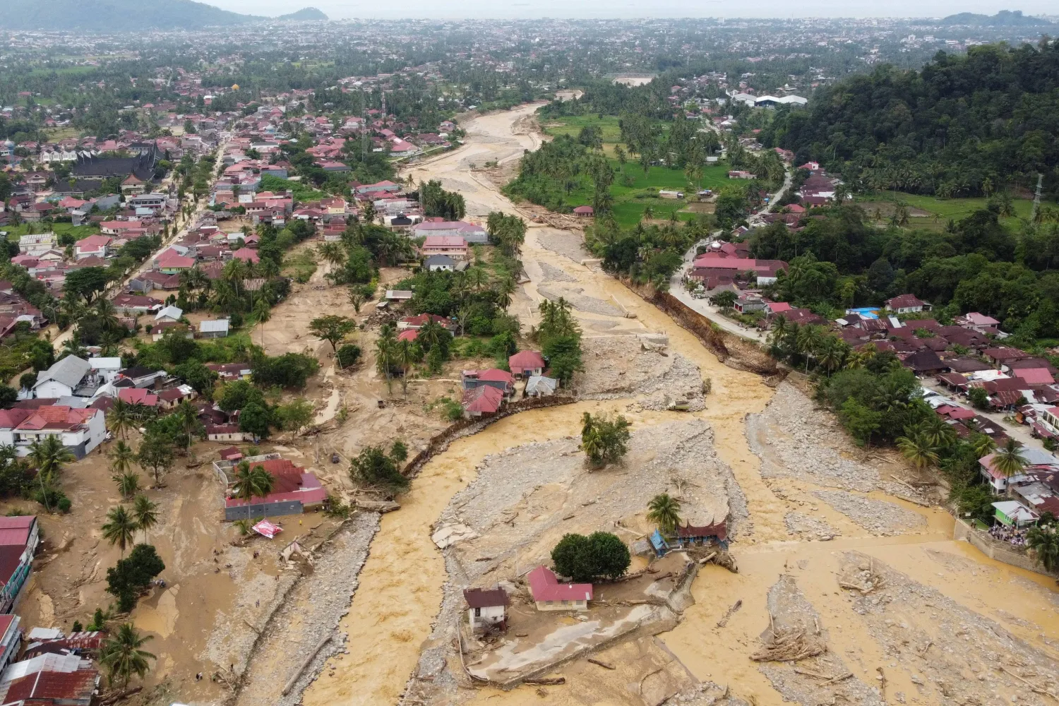 A drone view shows an area hit by deadly flash floods following heavy rains in Padang, West Sumatra province, Indonesia, November 30, 2025. REUTERS/Aidil Ichlas
