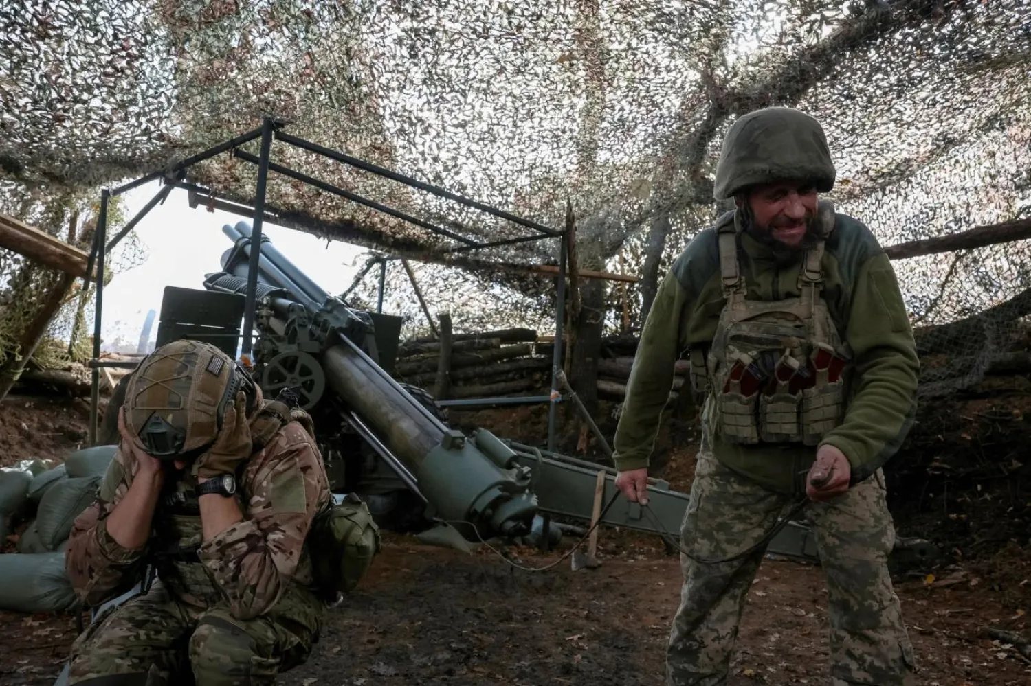 Kiev'e bağlı güçler, Rus ilerleyişine karşı koymak için direniyor (Reuters)